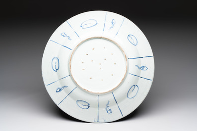 A massive Japanese Arita blue and white 'fisherman' dish, Edo, 17th C.