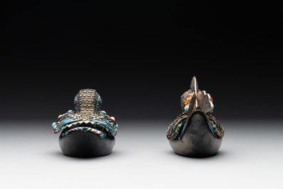 Two Chinese enamelled filigree silver mandarin duck-form boxes and covers inset with precious stones, 19/20th C.