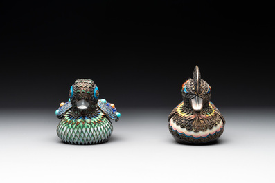 Two Chinese enamelled filigree silver mandarin duck-form boxes and covers inset with precious stones, 19/20th C.
