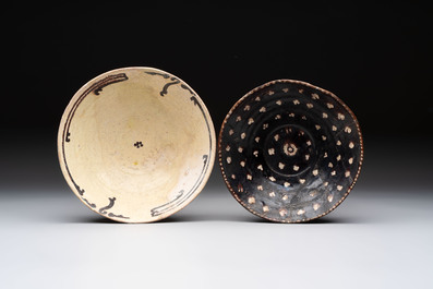 A Samanid pottery 'Kufic' inscribed bowl and a white-spotted brown-ground bowl, Iran, 10th C.