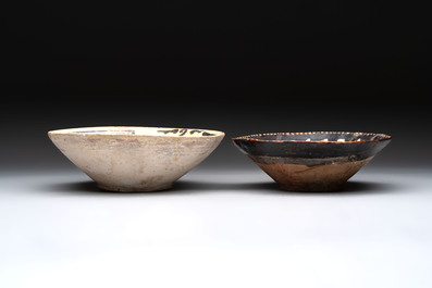 A Samanid pottery 'Kufic' inscribed bowl and a white-spotted brown-ground bowl, Iran, 10th C.