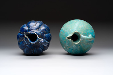 A Kashan turquoise-glazed ewer and a Nishapur blue-glazed ewer, Iran, 12th C.