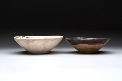 A Samanid pottery 'Kufic' inscribed bowl and a white-spotted brown-ground bowl, Iran, 10th C.