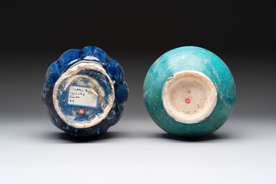 A Kashan turquoise-glazed ewer and a Nishapur blue-glazed ewer, Iran, 12th C.