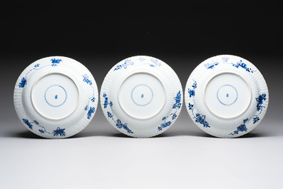 Six Chinese blue and white 'peony scroll' plates, Kangxi