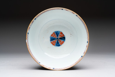 Seven Chinese Imari-style and famille rose bowls with floral and figural designs, 18th C.