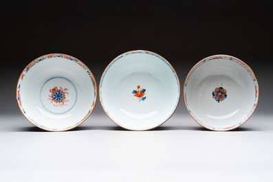 Seven Chinese Imari-style and famille rose bowls with floral and figural designs, 18th C.