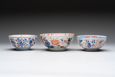 Seven Chinese Imari-style and famille rose bowls with floral and figural designs, 18th C.