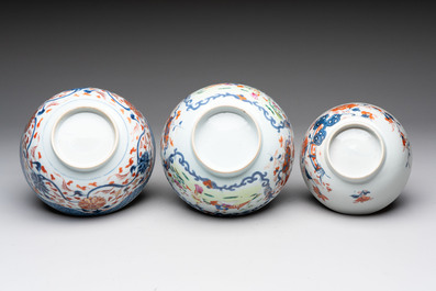 Seven Chinese Imari-style and famille rose bowls with floral and figural designs, 18th C.