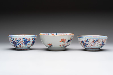 Seven Chinese Imari-style and famille rose bowls with floral and figural designs, 18th C.
