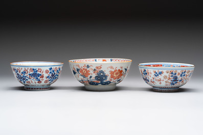 Seven Chinese Imari-style and famille rose bowls with floral and figural designs, 18th C.