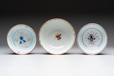 Seven Chinese Imari-style and famille rose bowls with floral and figural designs, 18th C.