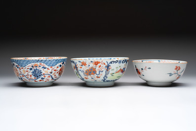 Seven Chinese Imari-style and famille rose bowls with floral and figural designs, 18th C.