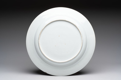 Six Chinese blue and white plates and a dish with landscape design, 18th C.