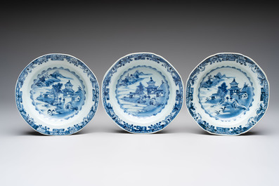 Six Chinese blue and white plates and a dish with landscape design, 18th C.