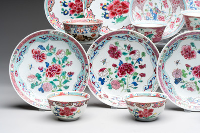 13 Chinese famille rose cups and 15 saucers, Yongzheng/Qianlong