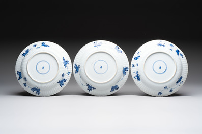 Six Chinese blue and white 'peony scroll' plates, Kangxi