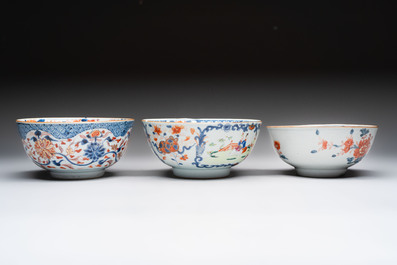 Seven Chinese Imari-style and famille rose bowls with floral and figural designs, 18th C.