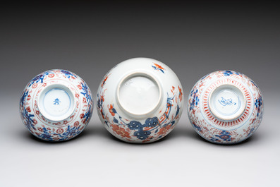 Seven Chinese Imari-style and famille rose bowls with floral and figural designs, 18th C.