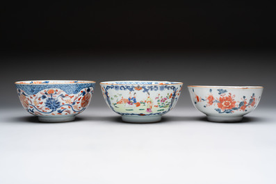 Seven Chinese Imari-style and famille rose bowls with floral and figural designs, 18th C.