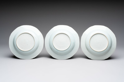Six Chinese blue and white plates and a dish with landscape design, 18th C.