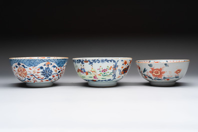 Seven Chinese Imari-style and famille rose bowls with floral and figural designs, 18th C.