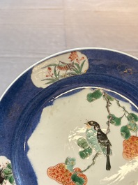 A pair of fine Chinese famille verte powder-blue-ground 'bird on branch' plates, Kangxi