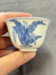 A Chinese blue and white 'Rotterdam Riot' cup and saucer, jade mark, Kangxi
