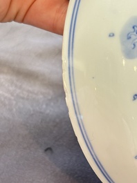 A Chinese blue and white 'dragon and carps' plate, Yongzheng mark and of the period
