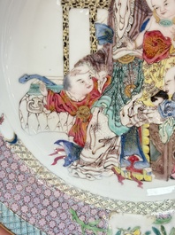 A fine Chinese famille rose ruby-back eggshell plate with a lady and playing boys, Yongzheng
