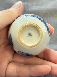 A fine Chinese blue and white miniature bottle vase with two ladies in a garden, jade 玉 mark, Kangxi