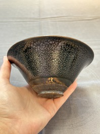 A rare Chinese black-glazed 'oil-spot' tea bowl, Song/Jin