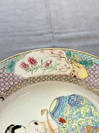 A fine Chinese famille rose ruby-back eggshell plate with a lady and playing boys, Yongzheng