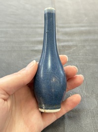 A pair of Chinese blue-glazed 'Hatcher Cargo' shipwreck bottle vases with incised dragons, Transitional period