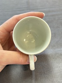 A varied collection of three Chinese famille rose 'mythological subject' cups and two saucers, Qianlong