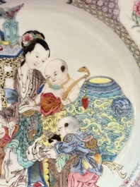 A fine Chinese famille rose ruby-back eggshell plate with a lady and playing boys, Yongzheng