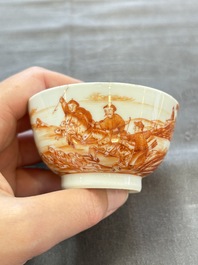 A Chinese iron-red-decorated 'Deer Hunting' cup and saucer, Qianlong