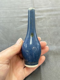 A pair of Chinese blue-glazed 'Hatcher Cargo' shipwreck bottle vases with incised dragons, Transitional period