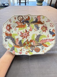 A pair of Chinese famille rose 'pseudo-tobacco leaf' dishes and a saucer, Qianlong
