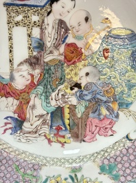 A fine Chinese famille rose ruby-back eggshell plate with a lady and playing boys, Yongzheng