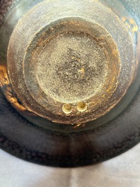 A rare Chinese black-glazed 'oil-spot' tea bowl, Song/Jin