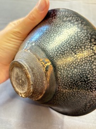 A rare Chinese black-glazed 'oil-spot' tea bowl, Song/Jin
