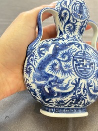 A rare and fine Chinese blue and white double gourd 'dragon' vase with ruyi handles, Qianlong mark and of the period