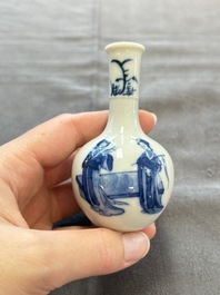 A fine Chinese blue and white miniature bottle vase with two ladies in a garden, jade 玉 mark, Kangxi