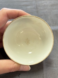A varied collection of three Chinese famille rose 'mythological subject' cups and two saucers, Qianlong