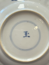 A Chinese blue and white 'Rotterdam Riot' cup and saucer, jade mark, Kangxi