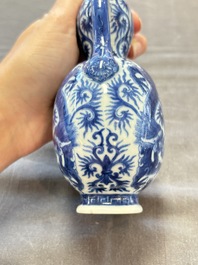 A rare and fine Chinese blue and white double gourd 'dragon' vase with ruyi handles, Qianlong mark and of the period