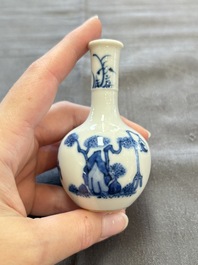 A fine Chinese blue and white miniature bottle vase with two ladies in a garden, jade 玉 mark, Kangxi