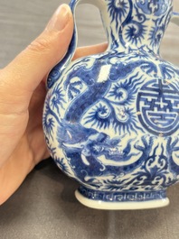 A rare and fine Chinese blue and white double gourd 'dragon' vase with ruyi handles, Qianlong mark and of the period