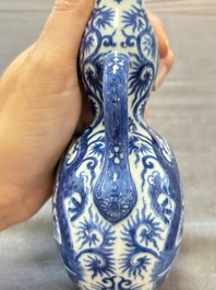 A rare and fine Chinese blue and white double gourd 'dragon' vase with ruyi handles, Qianlong mark and of the period